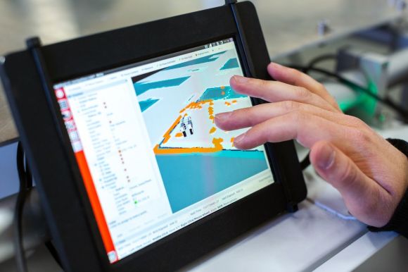 Virtual Farming - person holding black tablet computer