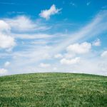 Air Purifying - landscape of grass field under blue sky